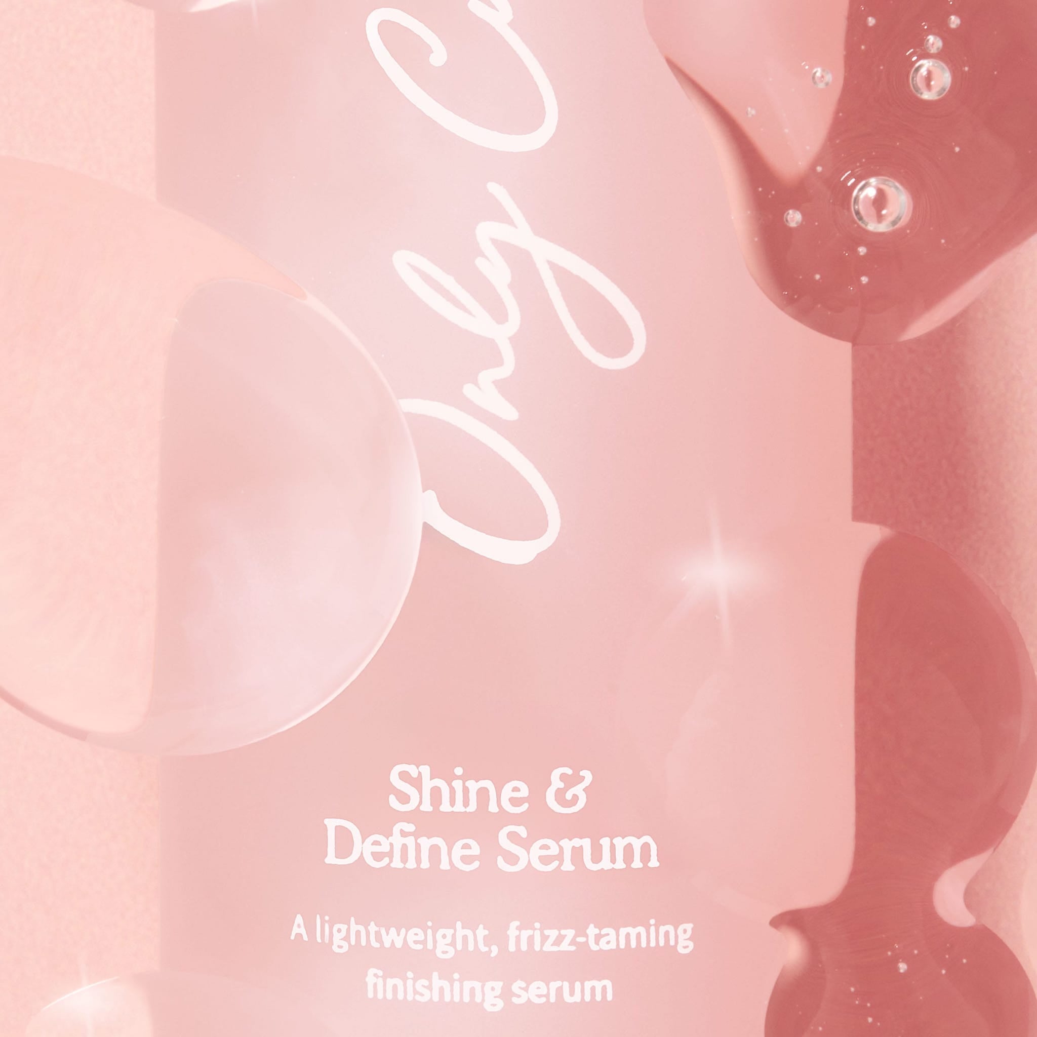 Only Curls Shine & Define Anti Frizz Serum for Curly Hair - bottle spill close up
