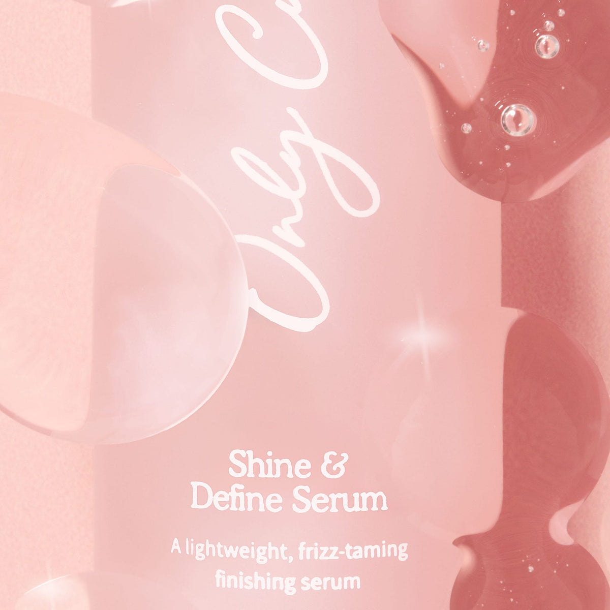 Only Curls Shine & Define Anti Frizz Serum for Curly Hair - bottle spill close up